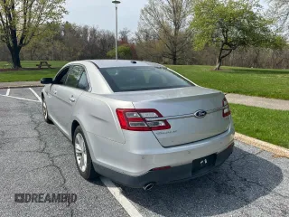 2013 Ford Taurus SEL with VIN 1FAHP2E85DG199414, listed as a Copart auction lot 54572685 with 122,416 mi miles and Clean Title. Bid and sale history available at carsss.com. Image 3.