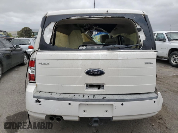 2009 Ford Flex SEL z VIN 2FMDK52C29BA15526, wystawiony jako Copart lot #53630793 z przebiegiem Nie podano mil oraz Szkoda całkowita • Salvage title. Historia ofert i sprzedaży dostępna na DreamBid. Obrazek 6.