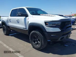 2022 Ram 1500 TRX with VIN 1C6SRFU95NN245954, listed as a IAAI auction lot 42032210 with 30,870 mi miles and . Bid and sale history available at DreamBid. Image 1.