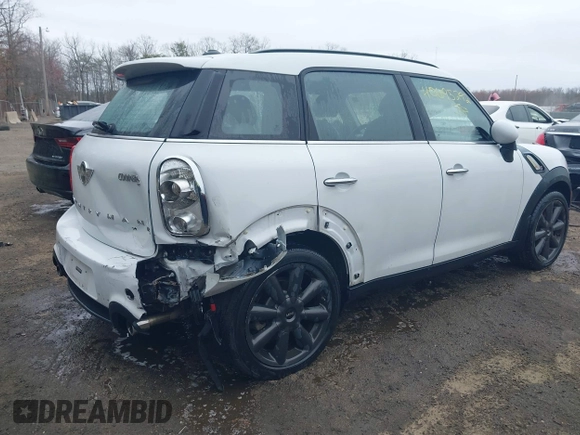 2014 MINI Countryman S with VIN WMWZC3C55EWP52138, listed as a IAAI auction lot 40695292 with 83,083 mi miles and . Bid and sale history available at DreamBid. Image 4.