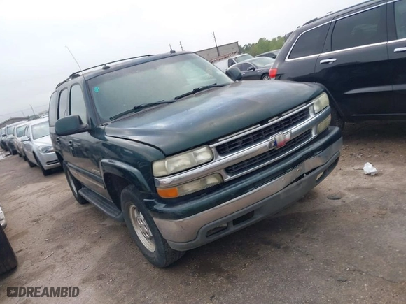 2003 Chevrolet Tahoe LT with VIN 1GNEC13Z03R268258, listed as a IAAI auction lot 41916956 with 218,720 mi miles. Bid and sale history available at carsss.com. Image 1.