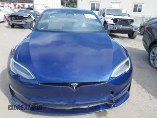 2021 Tesla Model S Long Range with VIN 5YJSA1E51MF442874, listed as a IAAI auction lot 39406495 with 36,127 mi miles and . Bid and sale history available at DreamBid. Image 13.