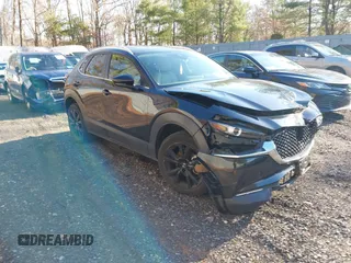 2022 Mazda CX-30 2.5 Turbo with VIN 3MVDMBAY4NM440991, listed as a IAAI auction lot 41072268 with 29,850 mi miles and . Bid and sale history available at carsss.com. Image 1.