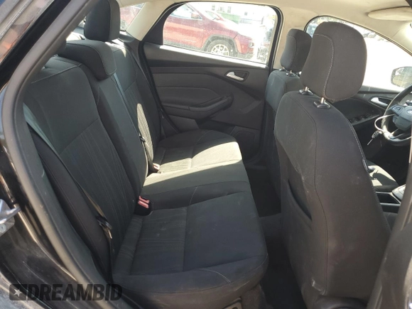 2018 Ford Focus SE z VIN 1FADP3FEXJL256542, wystawiony jako Copart lot #54583915 z przebiegiem 107 774 mil mil oraz Szkoda całkowita • Salvage title. Historia ofert i sprzedaży dostępna na DreamBid. Obrazek 10.