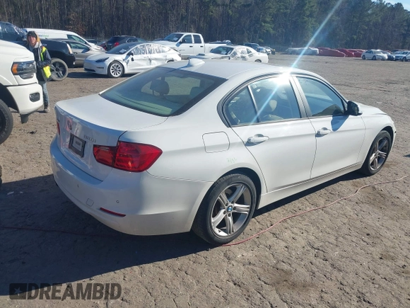 2015 BMW 3 Series 320i xDrive with VIN WBA3C3C50FK201906, listed as a IAAI auction lot 41287902 with 77,726 mi miles and . Bid and sale history available at DreamBid. Image 4.