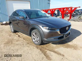 2021 Mazda CX-30 Premium with VIN 3MVDMBDL7MM305633, listed as a IAAI auction lot 42490854 with 33,420 mi miles and . Bid and sale history available at DreamBid. Image 1.