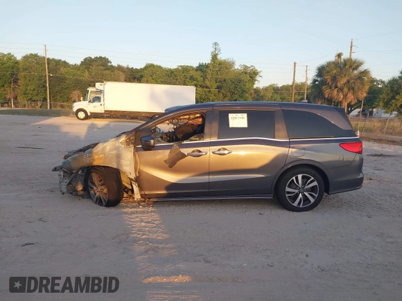 2023 Honda Odyssey Touring with VIN 5FNRL6H84PB053582, listed as a IAAI auction lot 42012108 with Not Provided miles and . Bid and sale history available at DreamBid. Image 13.