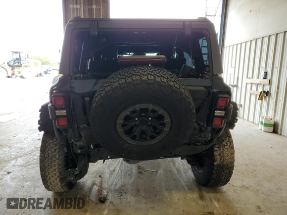 2023 Ford Bronco Raptor with VIN 1FMEE5JR7PLB23414, listed as a Copart auction lot 54733335 with 11,967 mi miles and Salvage title. Bid and sale history available at DreamBid. Image 6.