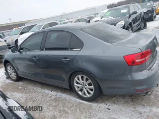2015 Volkswagen Jetta Sport with VIN 3VWD17AJ6FM319596, listed as a IAAI auction lot 41370591 with 92,818 mi miles and . Bid and sale history available at DreamBid. Image 14.