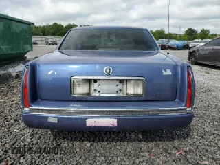 1995 Cadillac DeVille z VIN 1G6KD52B3SU243924, wystawiony jako Copart lot #56945395 z przebiegiem 72 878 mil mil oraz Szkoda całkowita • Salvage title. Historia ofert i sprzedaży dostępna na DreamBid. Obrazek 6.