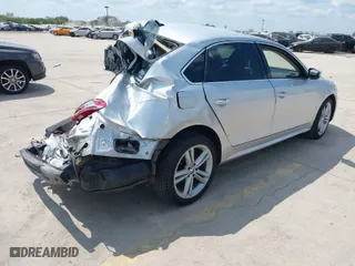 2015 Volkswagen Passat 2.0L TDI SEL Premium with VIN 1VWCV7A33FC041596, listed as a IAAI auction lot 40328327 with 161,489 mi miles. Bid and sale history available at carsss.com. Image 4.