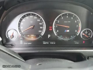 2016 BMW X5 M with VIN 5YMKT6C54G0R79100, listed as a Copart auction lot 55699044 with 106,772 mi miles. Bid and sale history available at carsss.com. Image 9.