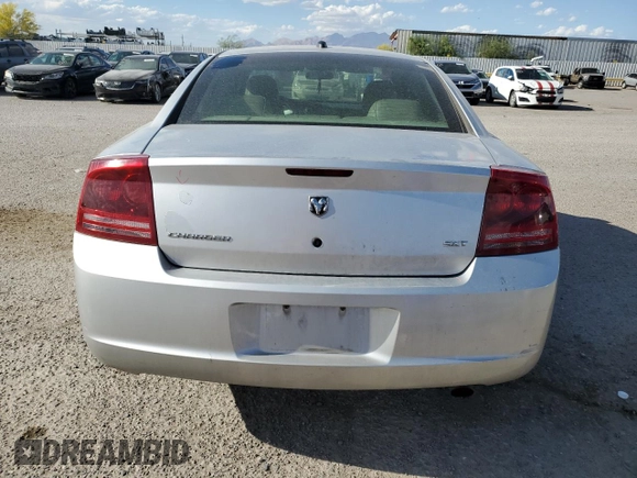 2006 Dodge Charger with VIN 2B3KA43G16H133667, listed as a Copart auction lot 53286435 with 118,997 mi miles and Salvage Title. Bid and sale history available at DreamBid. Image 6.