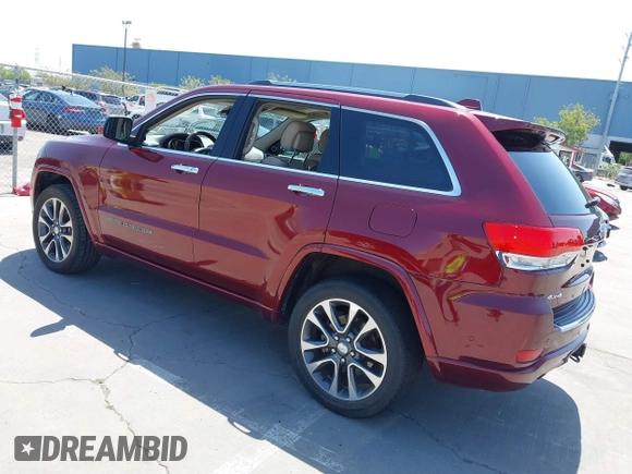 2017 Jeep Grand Cherokee Overland with VIN 1C4RJFCTXHC676236, listed as a IAAI auction lot 42164645 with 94,658 mi miles and . Bid and sale history available at DreamBid. Image 3.