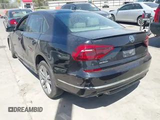 2018 Volkswagen Passat 2.0T S with VIN 1VWAA7A31JC015784, listed as a IAAI auction lot 41829586 with 72,437 mi miles. Bid and sale history available at carsss.com. Image 3.