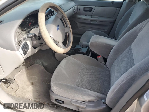 2006 Ford Taurus SE with VIN 1FAFP53U26A201473, listed as a Copart auction lot 81247754 with Not Provided miles and Salvage Title. Bid and sale history available at DreamBid. Image 7.