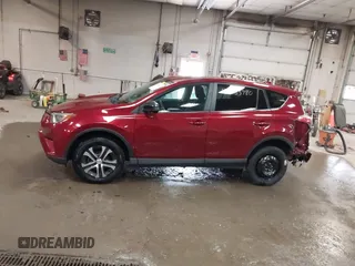 2018 Toyota RAV4 LE with VIN 2T3BFREV9JW825953, listed as a IAAI auction lot 42463780 with 74,128 mi miles and . Bid and sale history available at DreamBid. Image 14.