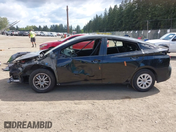2021 Toyota Prius L Eco with VIN JTDKAMFU3M3140233, listed as a IAAI auction lot 42182685 with 38,842 mi miles and . Bid and sale history available at DreamBid. Image 6.