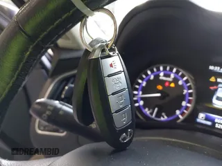 2015 Infiniti Q50 Premium z VIN JN1BV7AR9FM423471, wystawiony jako IAAI lot #42641857 z przebiegiem 86 919 mil mil oraz . Historia ofert i sprzedaży dostępna na DreamBid. Obrazek 11.