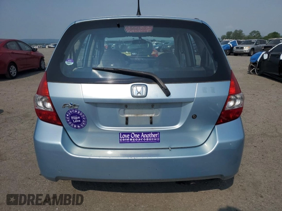 2007 Honda Fit z VIN JHMGD38487S045082, wystawiony jako Copart lot #59336665 z przebiegiem 73 754 mil mil oraz Szkoda całkowita • Salvage title. Historia ofert i sprzedaży dostępna na DreamBid. Obrazek 6.