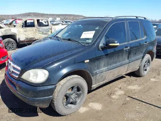 1998 Mercedes-Benz M-Class with VIN 4JGAB54EXWA030493, listed as a IAAI auction lot 41695224 with 249,325 mi miles. Bid and sale history available at carsss.com. Image 2.
