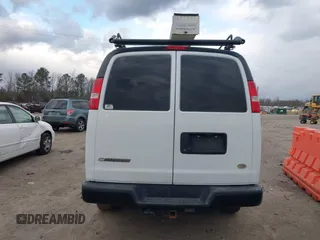 2017 Chevrolet Express Cargo Van with VIN 1GCWGBFG4H1348685, listed as a IAAI auction lot 41234959 with 215,067 mi miles. Bid and sale history available at carsss.com. Image 16.