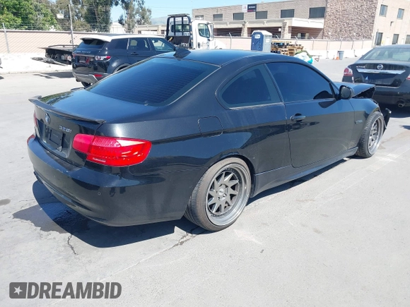 2011 BMW 3 Series 328i with VIN WBAKE3C51BE557814, listed as a IAAI auction lot 42196874 with 114,255 mi miles and . Bid and sale history available at carsss.com. Image 4.