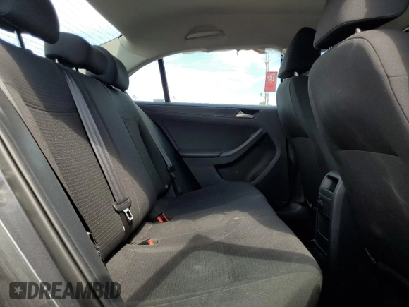 2015 Volkswagen Jetta S with VIN 3VW2K7AJ5FM327788, listed as a Copart auction lot 64034985 with 43,172 mi miles and Salvage title. Bid and sale history available at DreamBid. Image 10.