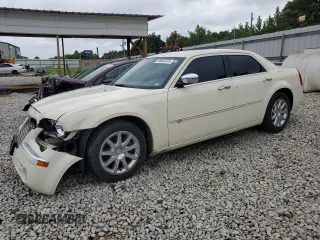 2009 Chrysler 300 C Hemi z VIN 2C3KA63TX9H619703, wystawiony jako Copart lot #60902075 z przebiegiem 140 003 mil mil oraz Szkoda całkowita • Salvage title. Historia ofert i sprzedaży dostępna na DreamBid. Obrazek 1.