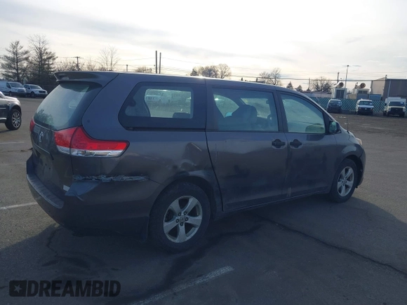 2012 Toyota Sienna with VIN 5TDZK3DCXCS258843, listed as a IAAI auction lot 41700446 with 207,384 mi miles. Bid and sale history available at carsss.com. Image 6.