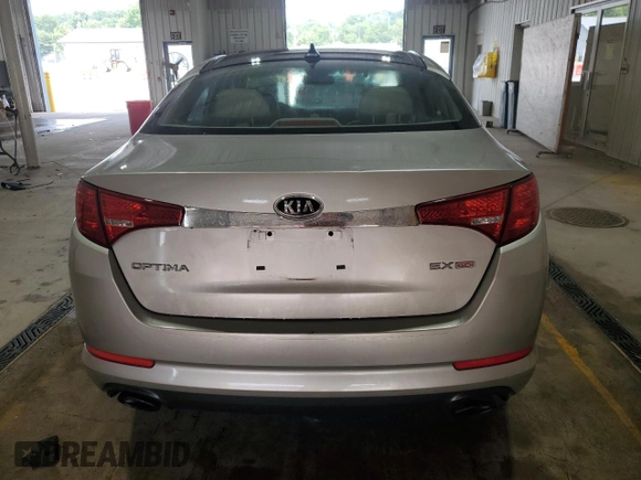 2011 Kia Optima EX z VIN KNAGN4A73B5168902, wystawiony jako Copart lot #59569365 z przebiegiem 160 297 mil mil oraz Szkoda całkowita • Salvage title. Historia ofert i sprzedaży dostępna na DreamBid. Obrazek 6.