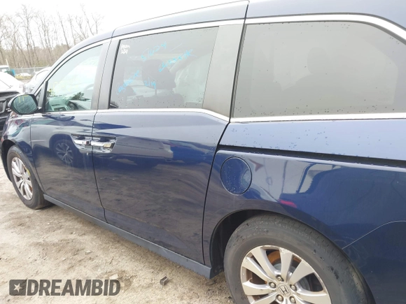 2016 Honda Odyssey SE with VIN 5FNRL5H38GB111448, listed as a IAAI auction lot 41754302 with 114,282 mi miles and . Bid and sale history available at DreamBid. Image 14.