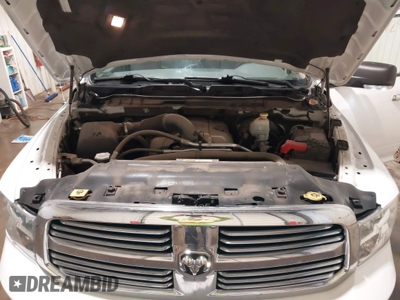 2015 Ram 1500 Big Horn z VIN 1C6RR7LT3FS519298, wystawiony jako IAAI lot #41724865 z przebiegiem 123 385 mil mil oraz . Historia ofert i sprzedaży dostępna na DreamBid. Obrazek 10.