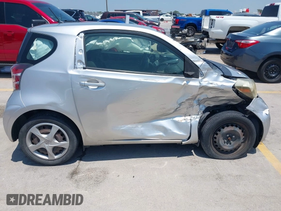 2012 Scion iQ with VIN JTNJJXB07CJ018562, listed as a IAAI auction lot 42404672 with 79,867 mi miles and . Bid and sale history available at DreamBid. Image 14.
