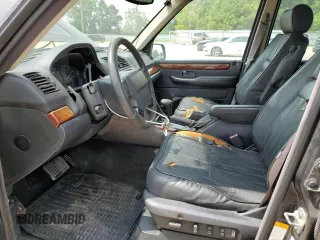 1999 Land Rover Range Rover z VIN SALPV1442XA426711, wystawiony jako Copart lot #57434985 z przebiegiem 253 151 mil mil oraz Tytuł czysty. Historia ofert i sprzedaży dostępna na DreamBid. Obrazek 7.