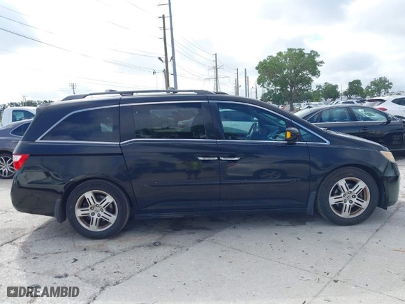 2013 Honda Odyssey Touring with VIN 5FNRL5H92DB003200, listed as a IAAI auction lot 41920237 with 167,483 mi miles. Bid and sale history available at carsss.com. Image 13.