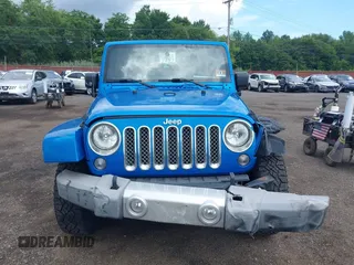 2015 Jeep Wrangler Unlimited Sahara with VIN 1C4BJWEG4FL677879, listed as a IAAI auction lot 42676097 with 85,821 mi miles and . Bid and sale history available at DreamBid. Image 17.