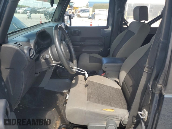 2008 Jeep Wrangler X z VIN 1J4FA24178L619687, wystawiony jako Copart lot #62535985 z przebiegiem 137 710 mil mil oraz Szkoda całkowita • Salvage title. Historia ofert i sprzedaży dostępna na DreamBid. Obrazek 7.