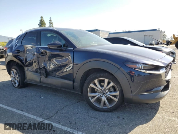 2020 Mazda CX-30 Premium with VIN 3MVDMAEM2LM134841, listed as a Copart auction lot 51979355 with 48,926 mi miles and Salvage title. Bid and sale history available at DreamBid. Image 4.