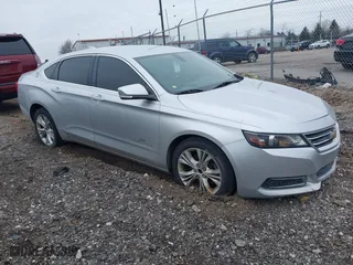 2015 Chevrolet Impala LT with VIN 1G1125S30FU138781, listed as a IAAI auction lot 41696424 with 150,239 mi miles. Bid and sale history available at carsss.com. Image 1.