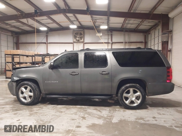 2011 Chevrolet Suburban LT with VIN 1GNSCJE0XBR180270, listed as a IAAI auction lot 41531193 with 202,493 mi miles. Bid and sale history available at carsss.com. Image 14.