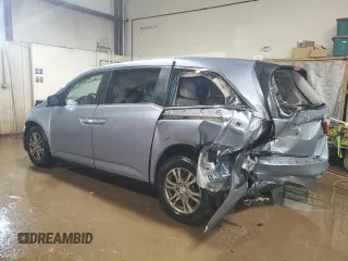 2013 Honda Odyssey EX-L with VIN 5FNRL5H64DB080141, listed as a Copart auction lot 49553235 with 128,358 mi miles and Salvage Title. Bid and sale history available at carsss.com. Image 2.