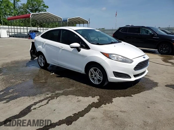 2019 Ford Fiesta SE z VIN 3FADP4BJ2KM147288, wystawiony jako Copart lot #55391125 z przebiegiem 83 887 mil mil oraz Szkoda całkowita • Salvage title. Historia ofert i sprzedaży dostępna na DreamBid. Obrazek 14.