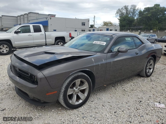 2015 Dodge Challenger SXT with VIN 2C3CDZAG4FH728088, listed as a Copart auction lot 52515645 with 128,104 mi miles and Salvage Title. Bid and sale history available at carsss.com. Image 1.