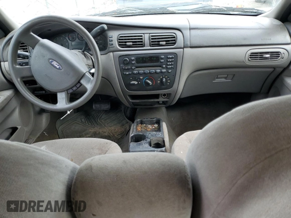 2007 Ford Taurus SE with VIN 1FAFP53U07A101535, listed as a Copart auction lot 56385185 with Not provided miles and Salvage title. Bid and sale history available at DreamBid. Image 8.