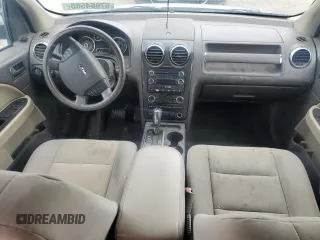 2008 Ford Taurus X SEL z VIN 1FMDK02W58GA14293, wystawiony jako Copart lot #57664585 z przebiegiem 145 529 mil mil oraz Szkoda całkowita • Salvage title. Historia ofert i sprzedaży dostępna na DreamBid. Obrazek 8.