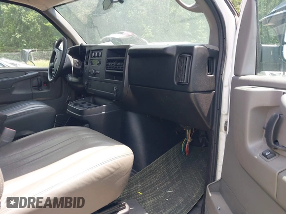 2014 Chevrolet Express Cargo with VIN 1GCWGFBA4E1207247, listed as a IAAI auction lot 42259244 with 169,971 mi miles and . Bid and sale history available at DreamBid. Image 5.