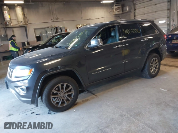 2015 Jeep Grand Cherokee Limited with VIN 1C4RJFBG5FC941811, listed as a IAAI auction lot 41003336 with 137,867 mi miles. Bid and sale history available at carsss.com. Image 17.