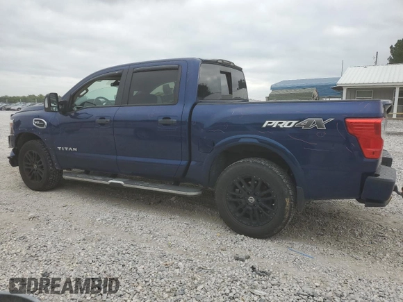 2017 Nissan Titan Pro-4X with VIN 1N6AA1E53HN570548, listed as a Copart auction lot 71663224 with 128,024 mi miles and Salvage title. Bid and sale history available at DreamBid. Image 2.