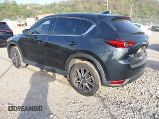 2018 Mazda CX-5 Grand Touring with VIN JM3KFBDM2J0463279, listed as a IAAI auction lot 42115309 with 68,851 mi miles. Bid and sale history available at carsss.com. Image 3.